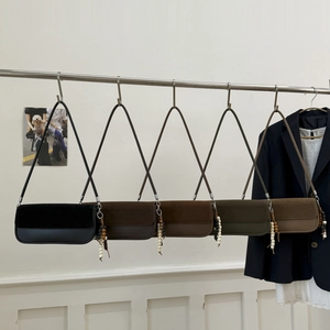 Fashion commuter crossbody bags in five colors with bohemian bead charms and suede texture