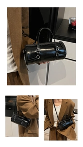 Detailed views of a black bowling bag showing handheld, shoulder and crossbody styling
