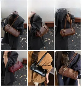 Détails de sacs sous les bras en cuir vintage en marron, bordeaux et noir élégant