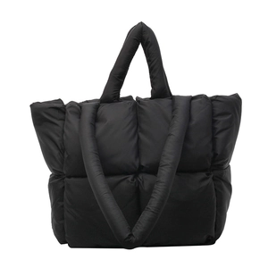 Large black quilted puffer tote bag with padded handles for winter casual daily use