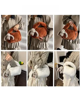Detailed plush crossbody bag featuring fluffy faux fur texture and metal chain strap