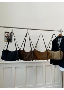 Detailed comparison of large tote bags in black, dark coffee, brown, and khaki suede