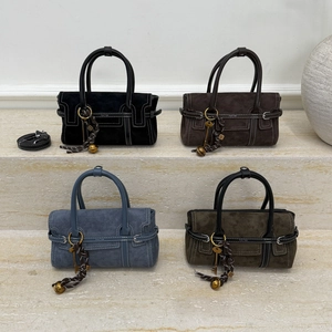 Minimalist suede handbag collection in four colors with shoulder straps and woven pendants