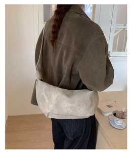 Chic light grey hobo bag for women with wide shoulder strap in minimalist style