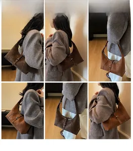 Multiple views of a vintage dark brown suede crescent shoulder bag worn by a model