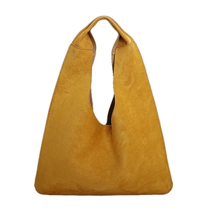 Minimalist mustard yellow suede shoulder bag with a unique triangular silhouette