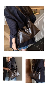 Close-up of brown vintage tote bag featuring a polished silver square metal buckle detail