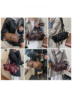 Fashionable large capacity shoulder bag shown in caramel brown, black, and red colors