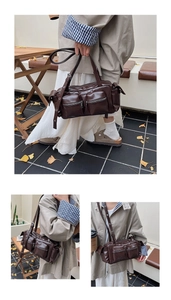 Close-up of vintage brown multi-pocket PU leather shoulder bag with zipper details