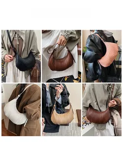 Detailed views of pleated crescent shoulder bag shown in five versatile colors