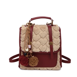 Retro deep red leather backpack with beige faux fur heart pattern and pom-poms