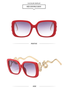 Detailed front and side view of red square sunglasses with golden snake-shaped temples