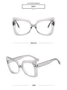 Detail view of transparent gray square glasses frames with unique serrated edge design