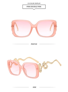 Macro detail of pink square sunglasses featuring golden 3D snake-shaped metal temples