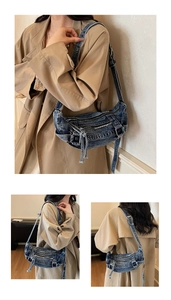 Close-up of vintage washed denim crossbody bag with multiple zippers and metal eyelets