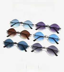 Detailed grid of rimless diamond-cut sunglasses in six various gradient color palettes