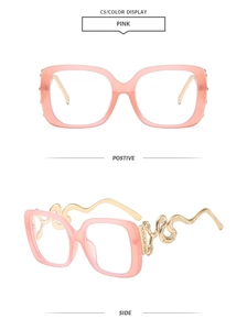 Detail of pink transparent square glasses featuring golden snake-shaped metal temples