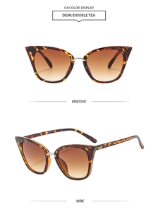 Detail of demi tortoise shell cat eye sunglasses with metal bridge and gradient tea lenses