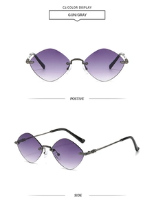 Detail view of rimless diamond cut sunglasses with purple gradient lenses and gunmetal frame