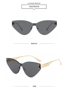 Details einer rahmenlosen Cat-Eye-Sonnenbrille mit silbernen Nieten und Metallbügeln