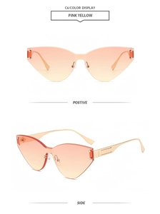 Detailansicht der randlosen Cat-Eye-Sonnenbrille mit pink-gelbem Verlauf und Goldbügeln