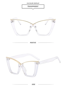 Detail of transparent cat-eye glasses frame with gold metal trim and sizing information