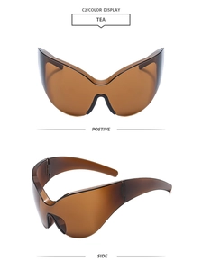 Vue détaillée des lunettes de soleil papillon sans monture de couleur thé futuriste
