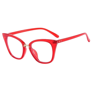 Classic cat-eye sunglasses with transparent red frames and golden metal bridge details