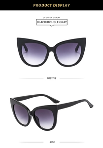 Front and side views of stylish cat-eye sunglasses with black frames and gradient lenses
