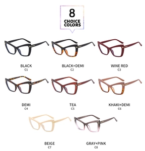 Detail view of T-shaped metal hinges on stylish cat-eye anti-blue light eyeglass frames