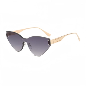 Randlose Cat-Eye-Sonnenbrille mit lila Verlaufsgläsern und goldenen Metallbügeln