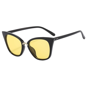 Classic cat-eye sunglasses with black frame, yellow lenses and golden metal bridge
