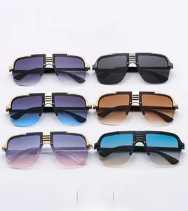 Detail view of vintage punk metal frames and colorful gradient lenses on sunglasses
