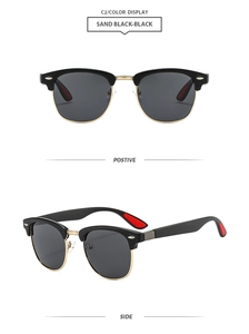 Detail view of classic sand black semi-rimless sunglasses with gold metal bridge