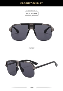 Front and side views of black oversized punk aviator sunglasses with metal top bar details
