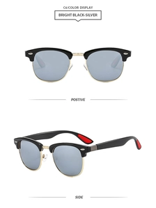 Close-up of classic semi-rimless sunglasses with bright black frame and silver metal bridge