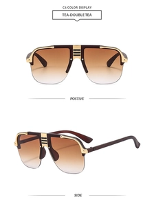 Detail view of oversized gradient tea sunglasses with punk style golden metal accents