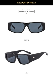Detail of rectangular sunglasses featuring wide temples and silver metal rivet accents
