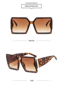 Detail of square oversized tortoiseshell sunglasses with quilted temples and golden accents