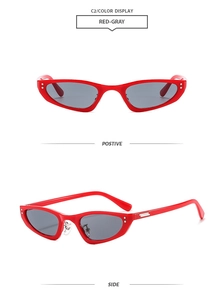 Détails de lunettes de soleil œil-de-chat rouges avec rivets argentés et plaquettes