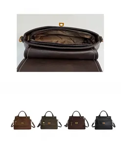 Detail view of the multi-compartment interior and four color options for the suede handbag
