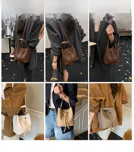 Street style display of a bucket bag with drawstring and versatile carrying straps