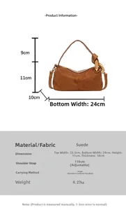 Size chart for brown suede cylinder bag showing dimensions and adjustable strap details