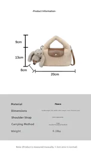 Detail of beige faux fur handbag with brown leather flap and adjustable long shoulder strap