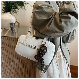 White vintage Boston shoulder bag for women, stylish large capacity tote purse with charm.