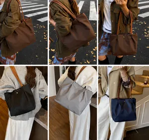 Nylon tote bags in four colors shown on models for daily commute and street style usage