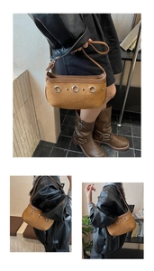 Détail du sac hobo en daim marron avec rivets métalliques vintage et œillets décoratifs