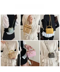 Detail of woven texture mini box bags with gold chain straps in multiple trendy colors