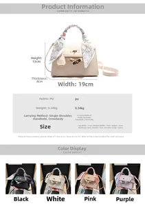 Detail of crocodile embossed PU leather bag with decorative scarf handle and metal clasp