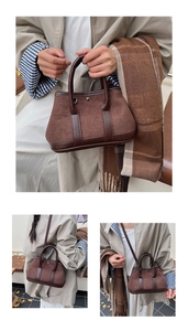 Detail showing dark brown patchwork crossbody bag with cylindrical handles and metal buckle